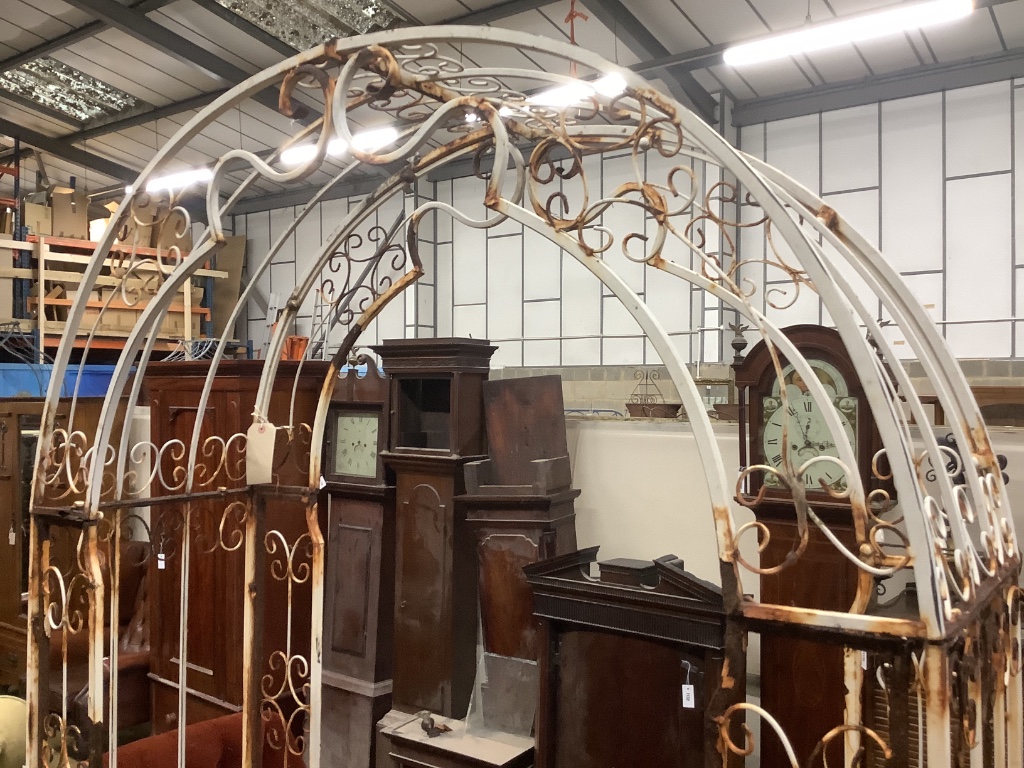 A vintage painted wrought iron garden arch, width 124cm, height 220cm